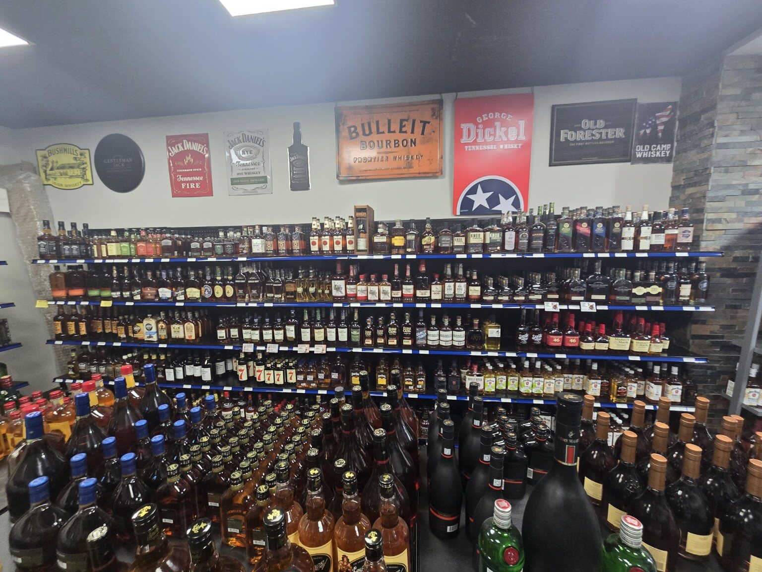 Bourbon and whiskey collection at Tiger Pride Mart