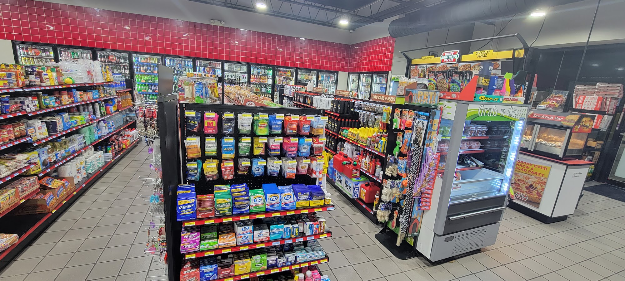 Wide interior view of Tiger Pride Mart convenience store
